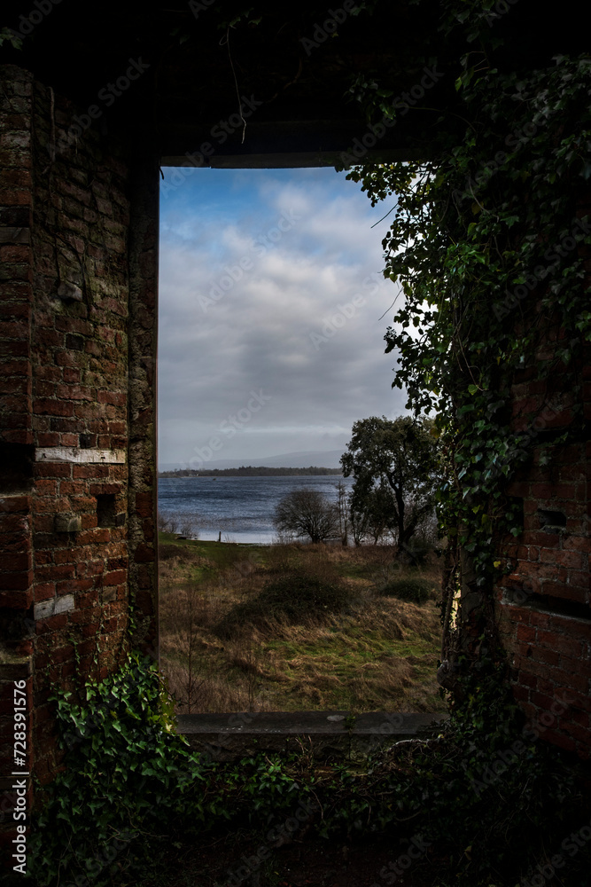 Different View
View from an abandoned manor house window out over a lake 