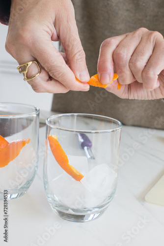 Close up of woman preparing a drink at home