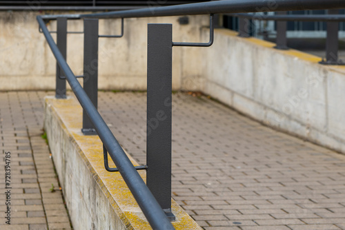 a railing on a footpath