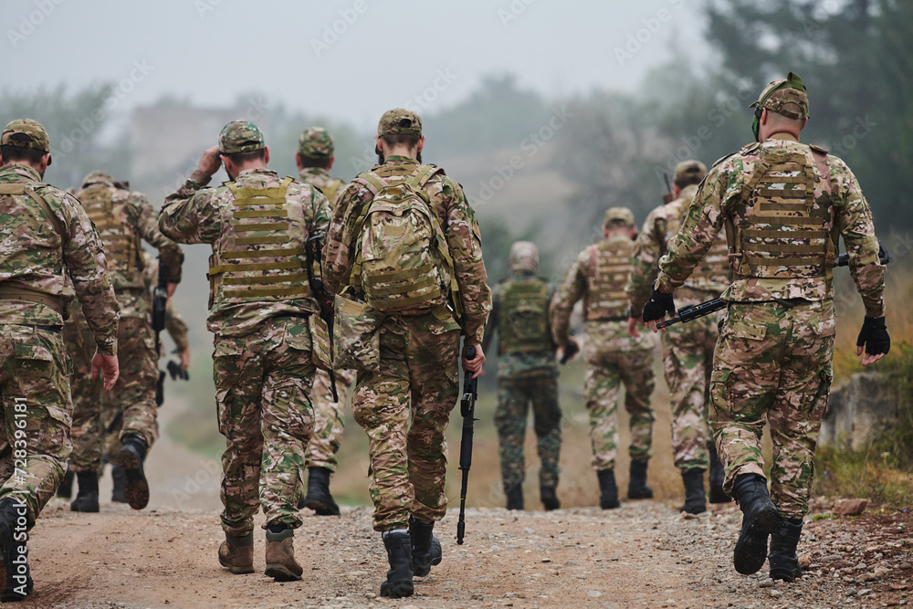 A disciplined and specialized military unit, donned in camouflage, strategically patrolling and maintaining control in a high-stakes environment, showcasing their precision, unity, and readiness for A disciplined and specialized military unit, donned in camouflage, strategically patrolling and maintaining control in a high-stakes environment, showcasing their precision, unity, and readiness for