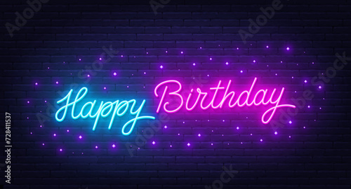 Happy Birthday neon text on brick wall background