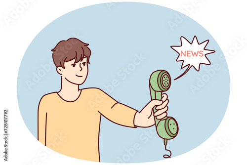 Man holds out landline phone to share news or important information. Handset with wire in hand of young guy who received call from municipal notification service. Flat vector illustration