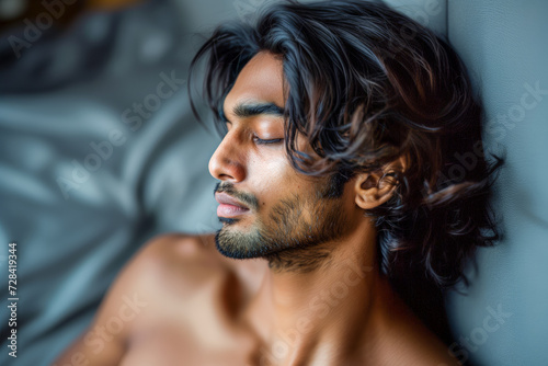 Serene Slumber: A young man with flowing hair finds peace in rest, his serene expression reflecting tranquility and rejuvenation. 