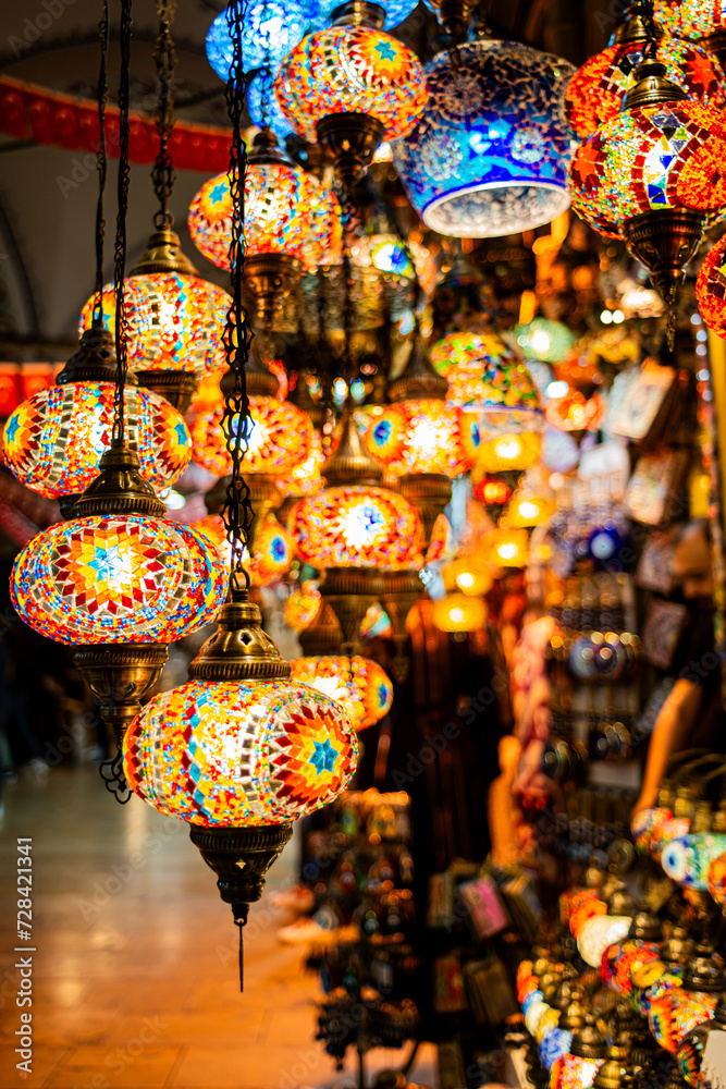 Bask in the enchanting glow of vibrant lanterns in the bazaar, a magical display of traditional crafts, handmade treasures, and artisanal elegance, creating an atmospheric and festive ambiance