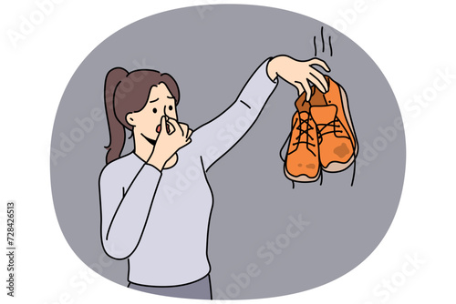 Woman hold in hands smell disgusting dirty shoes. Disgusted girl cover nose repelled with smelly footwear. Vector illustration.