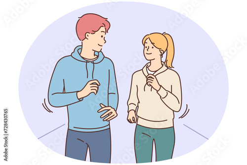 Happy couple jogging outdoors