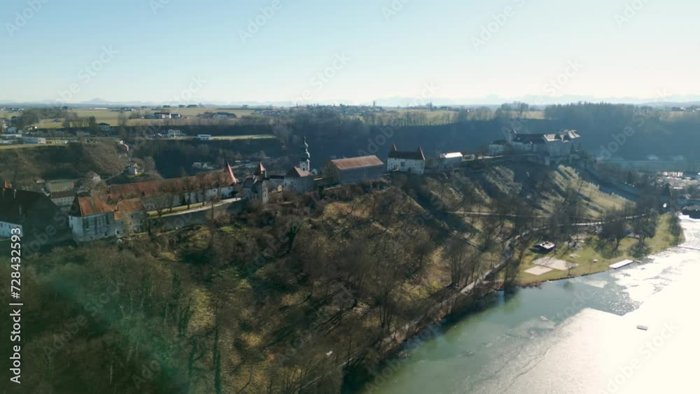 Drone Video of the Side of Burghausen Castle during Winter with frozen Lake Drone Video of the Side of Burghausen Castle during Winter with frozen Lake