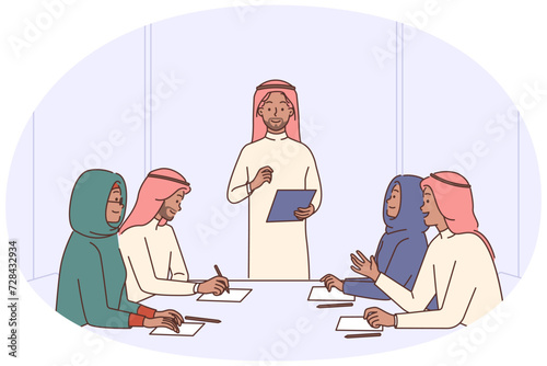Arabic businesspeople talk on meeting in office