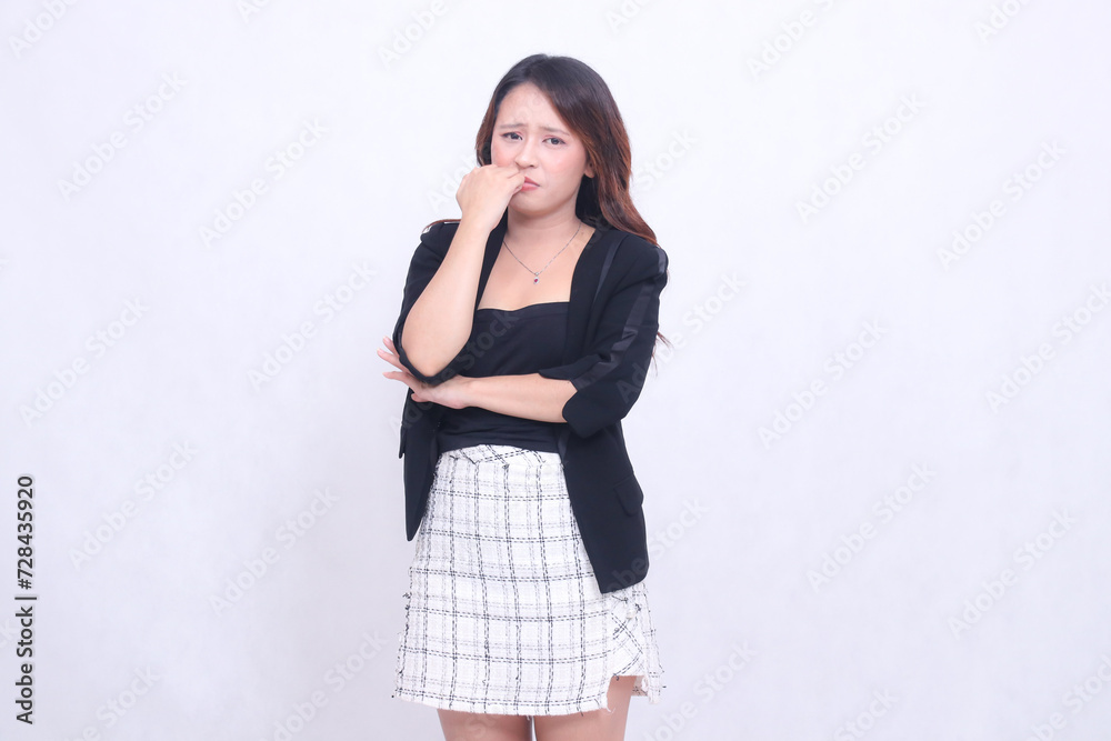 Beautiful Asian woman 20s formal elegant office scared hands folded into fists isolated on white background Beautiful Asian woman 20s formal elegant office scared hands folded into fists isolated on white background