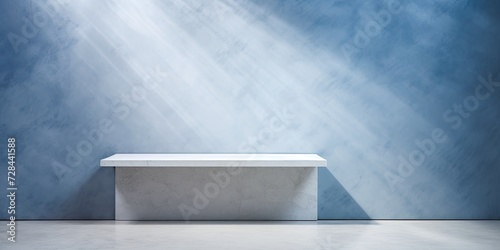 White marble table with corner light beam  shadow  and spotlight against blue concrete wall  perfect for product presentation backdrop and mock-up.