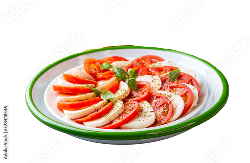 Italian caprese salad with sliced tomatoes, mozzarella, basil, olive oil
