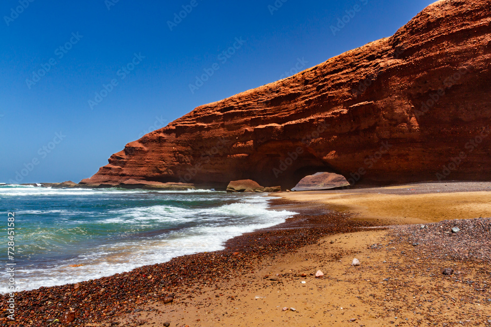 Spectacular natural red arch on atlantic ocean coast, Legzira ( or Lagzira, or Gzira) beach. Sidi Ifni, Morocco, Africa