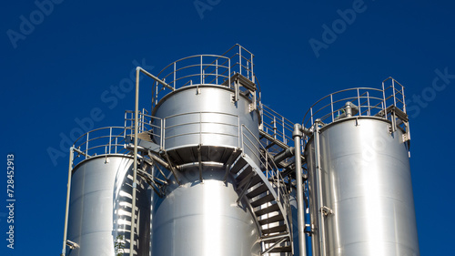Stainless steel silosand pipes with blue sky