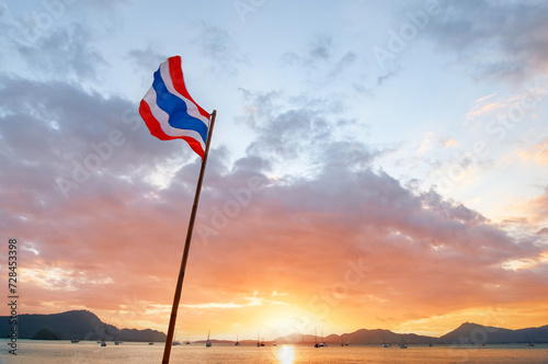 Flag of Thailand on the beautiful sunset background. Travel in Thailand concept.