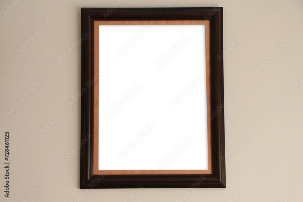 wooden frame on beige wall, frame mockup. wooden frame on beige wall, frame mockup.