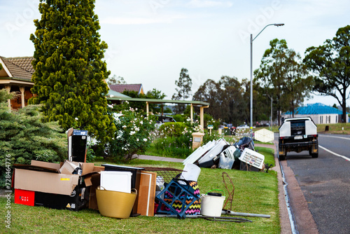 Pile of household junk on front lawn out for council bulk waste cleanup