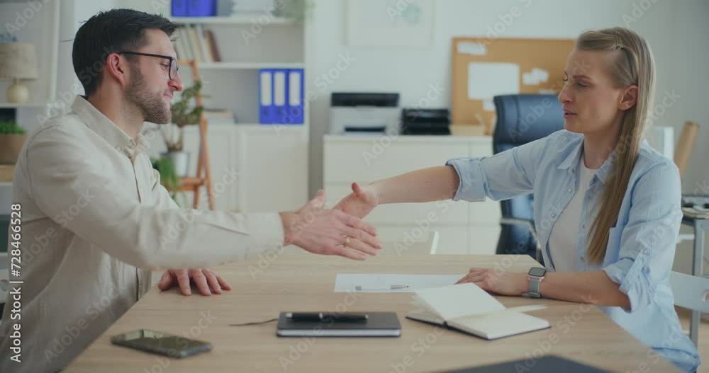 Interior Designers Working At Desk In Office Planning Interior Design. Interior Designers Working At Desk In Office Planning Interior Design.
