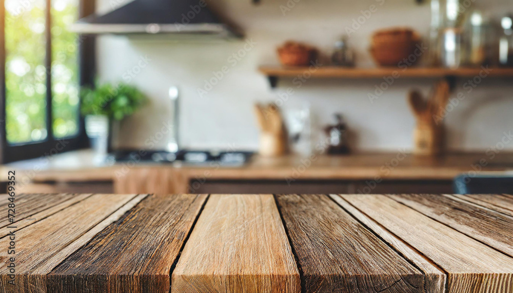 Brown wooden texture table over light blurred image of kitchen bench. kitchen blurred background.