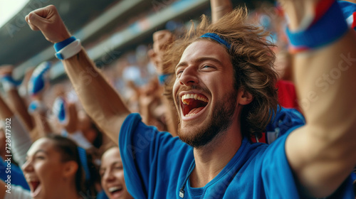 Ecstatic Crowd at Outdoor Event Celebrating with Enthusiasm