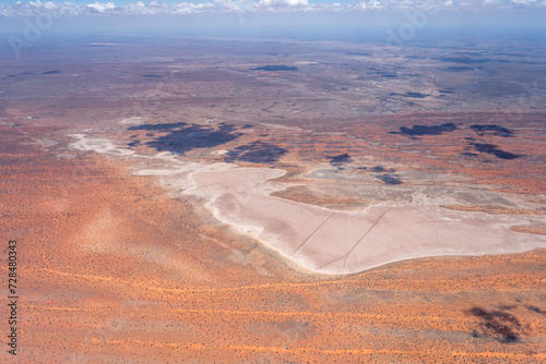 large pan and red dunes in Kalahari, east of Mariental, Namibia