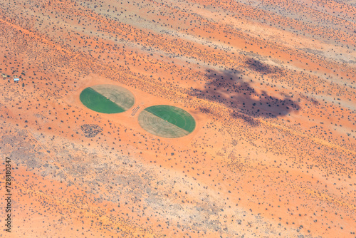 circular fields cultivation and dune stripes in Kalahari, south of Stampriet, Namibia photo