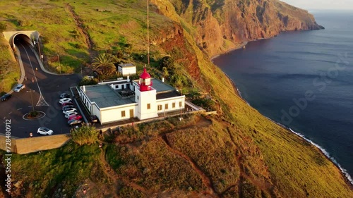 Aerial view to Lighthouse in the sunset Time. Lighthouse Ponta do Pargo, Madeira Portugal, travel background.  photo