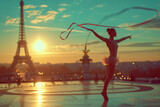 Young girl gymnast jumping with a ribbon in Paris at sunset
