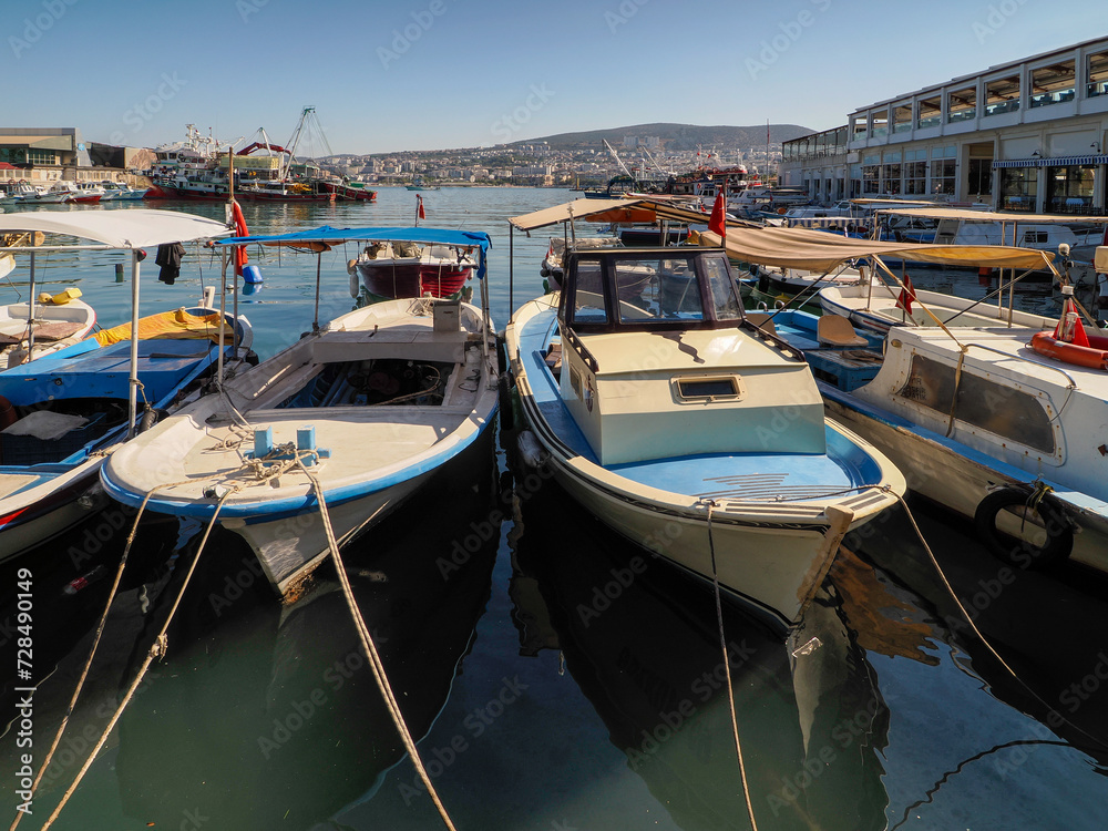 Obraz premium Marina with fishing boats in the port of Kusadasi, Türkiye
