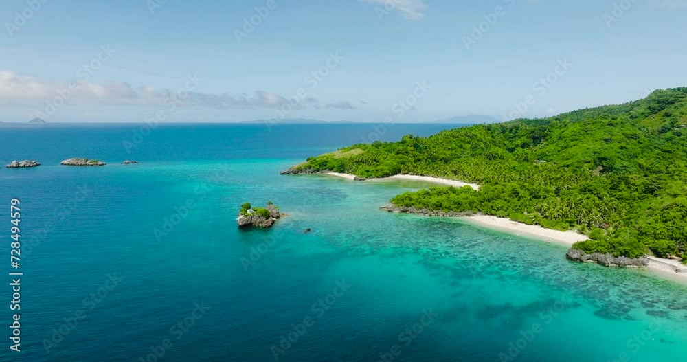 Aerial view of Islets and beach with white sand and boats in Cobrador Island. Romblon, Philippines. Aerial view of Islets and beach with white sand and boats in Cobrador Island. Romblon, Philippines.