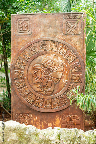 solar calendar of the Maya formed by circle of 19 months glyphs forms of the haab and a  time-bearing god