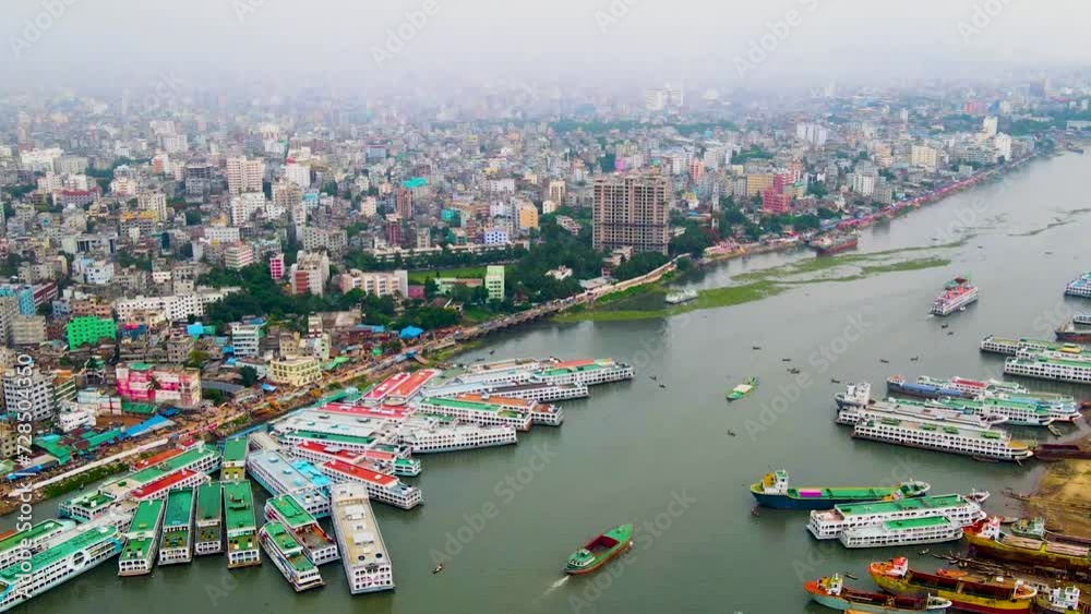 Crowded Scene Of Shipyard At Dhaka Wharf On The Buriganga River In Bangladesh, South Asia. Aerial Shot Crowded Scene Of Shipyard At Dhaka Wharf On The Buriganga River In Bangladesh, South Asia. Aerial Shot