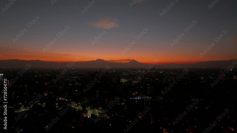 Colorful Shot Of Distant Volcano In Iztaccihuatl At Sunrise, Mexico City Colorful Shot Of Distant Volcano In Iztaccihuatl At Sunrise, Mexico City