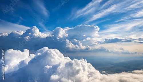 white fluffy clouds on blue sky in summer