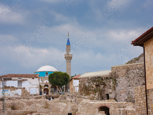 travel to ancient city of Side, Antalya coast of Turkey in tourist low season. mosque against background of cloudy morning sky