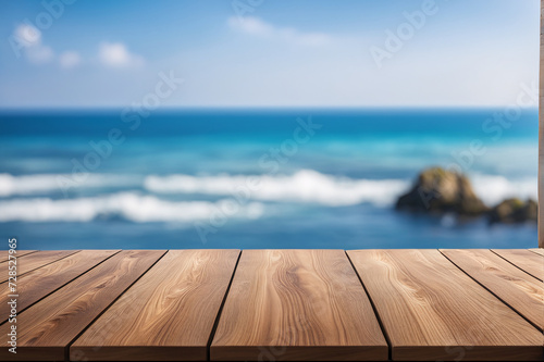 Wooden table top on blurred background of the sea
