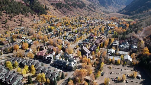 Slow flying drone shot over telluride, CO on a warm day in the fall photo