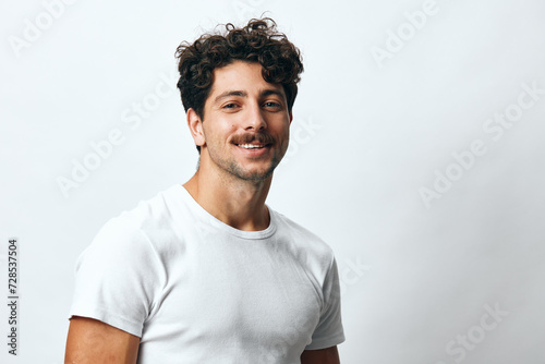 Man hispanic isolated portrait student white smile arms lifestyle fashion serious background t-shirt hipster © SHOTPRIME STUDIO
