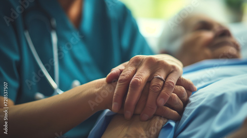 A close-up shot of a caregiver offering comfort and support to a patient photo