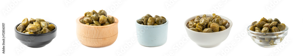 Capers in a bowl isolated on a white background. Marinated caper buds, small salted capparis in bowl, fermented food, pickled capers group.Organic spices and seasonings. Capers in a bowl isolated on a white background. Marinated caper buds, small salted capparis in bowl, fermented food, pickled capers group.Organic spices and seasonings.