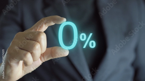 Businessman holding zero percentage on hand with copy space for sale discount promotion for Black Friday and merry Christmas happy new year period.