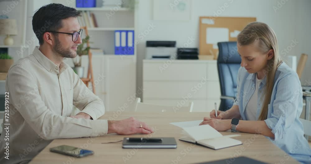 Interior Designers Working At Desk In Office Planning Interior Design. Interior Designers Working At Desk In Office Planning Interior Design.