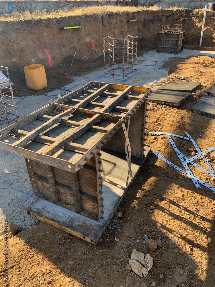 Cage of formwork ready to assembly and build foundation column. Matallic panels mounted to framework a concrete strucutre.