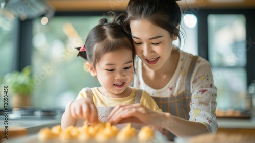 Woman and Little Girl Playfully Interact With Food