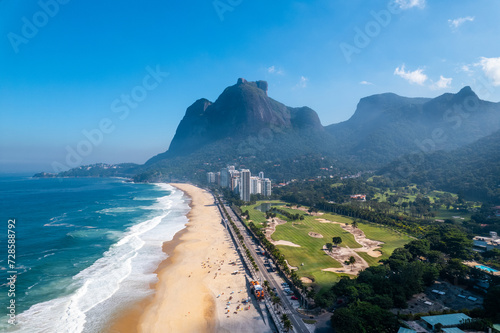 Linda vista aérea da praia de São Conrado, Zona Sul do Rio de Janeiro,  com a Pedra da Gávea ao fundo. photo