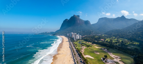 Linda vista panorâmica aérea da praia de São Conrado, Zona Sul do Rio de Janeiro,  com a Pedra da Gávea ao fundo. photo