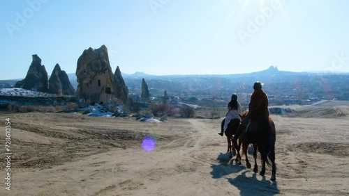 Landscape with horses and safari vehicles in Cappadocia