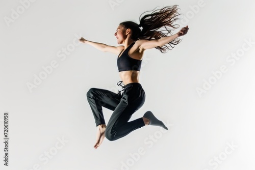 Woman Jumping in the Air With Windblown Hair