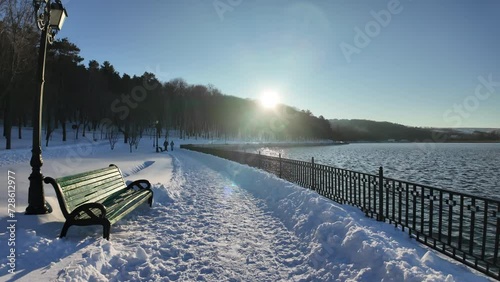 Valea Morilor lake and park covered in white snow in winter in Chisinau, Moldova photo