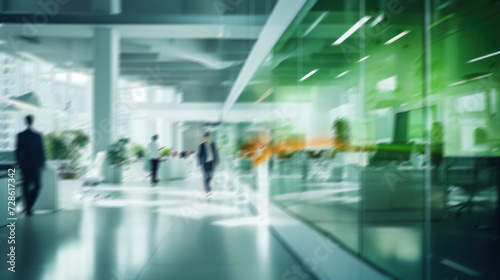 Blurred business background. Walking businessmen in a modern glass office center, shopping mall, bank. Movement effect, stylish interior with green plants © FoxTok