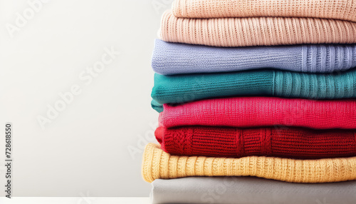 A stack of styled and washed sweaters